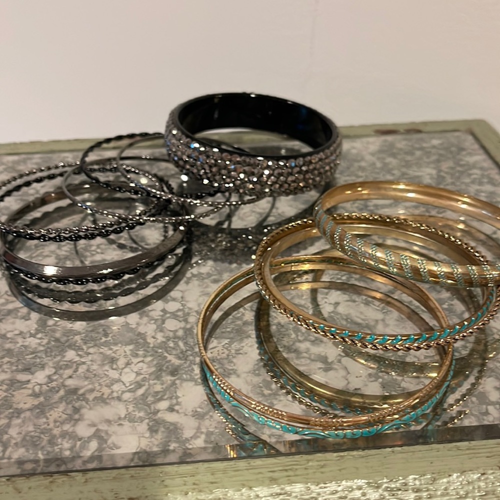 Black bangles, gold and green bangles